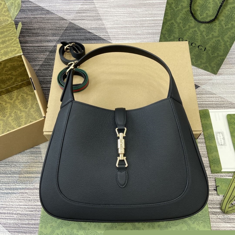 G*u*i top handle bags